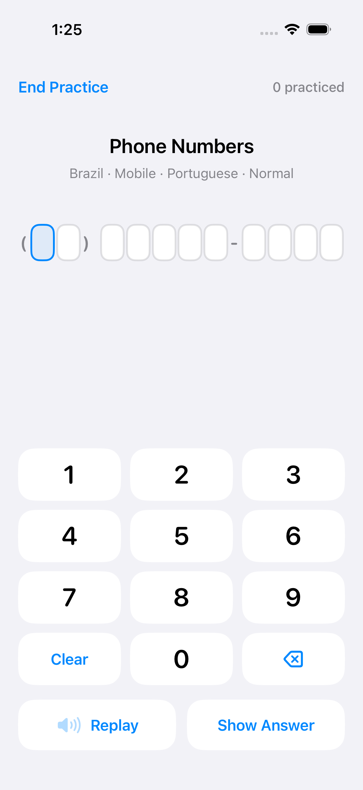 NumListen screen for Portuguese phone-number practice, with replay, segmented digit input, and a check control.